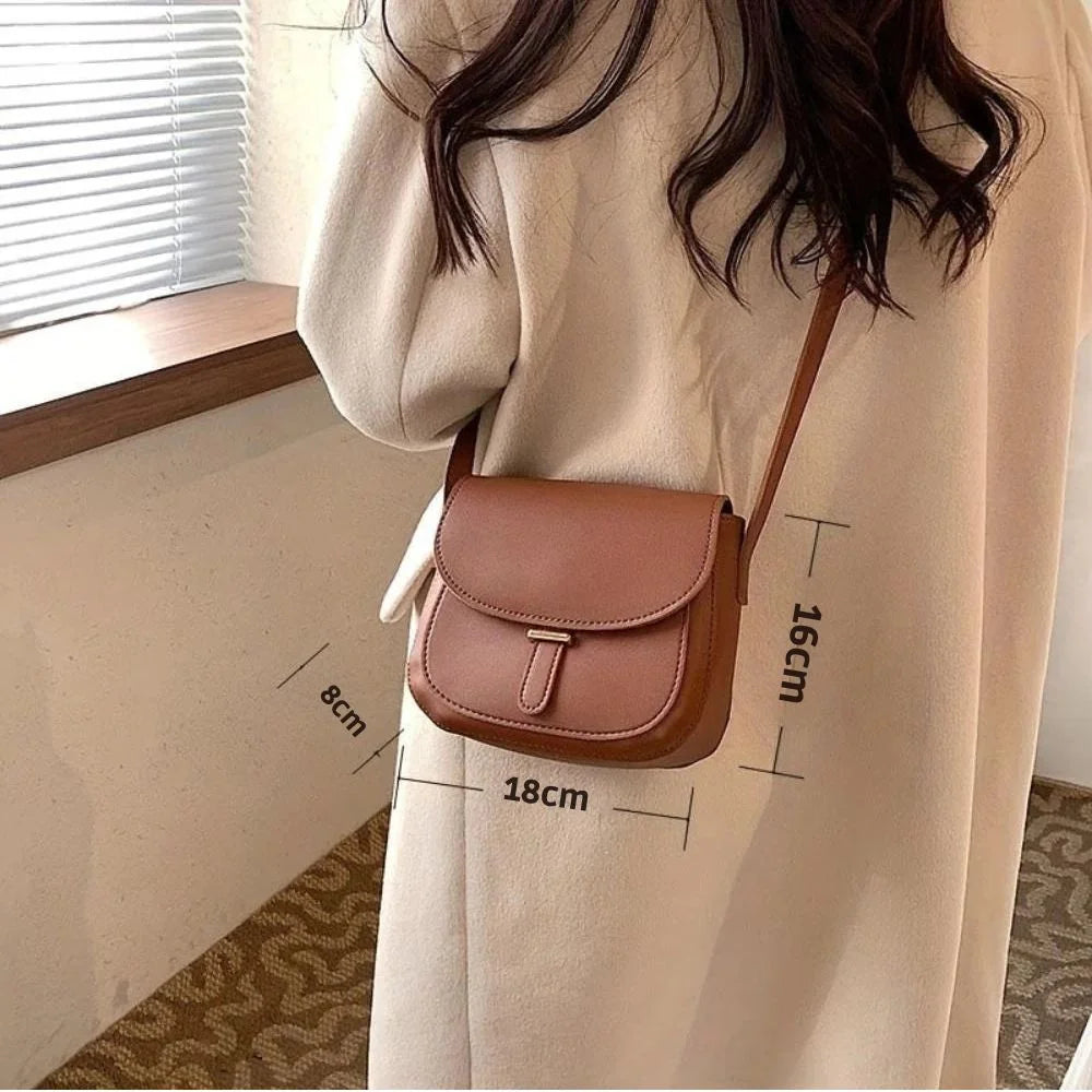 Helmine – Vintage Crossbody Saddle Bag